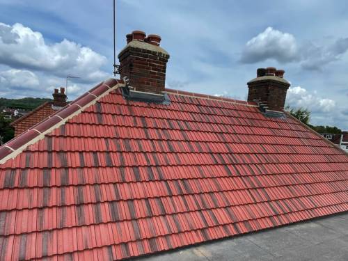Newly tiled pitched roof on a Somerset home